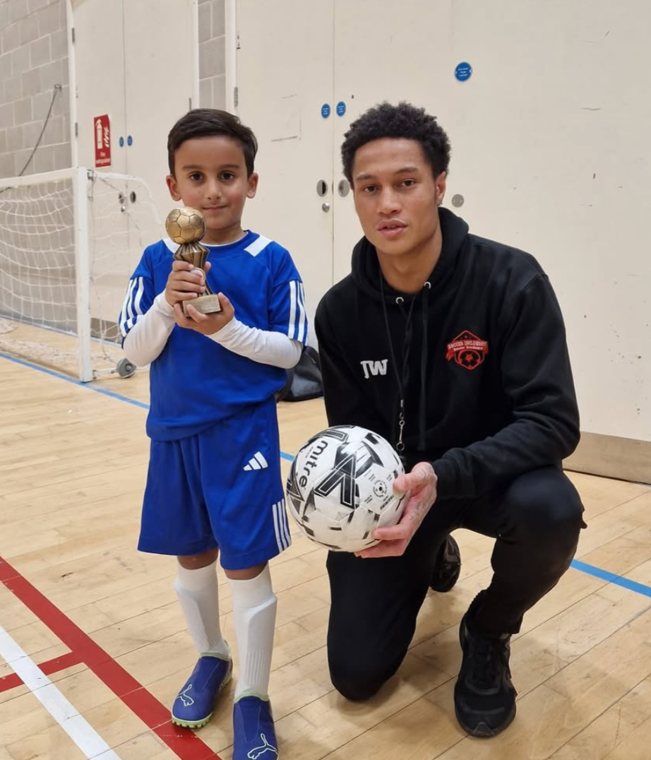 Young player with trophy